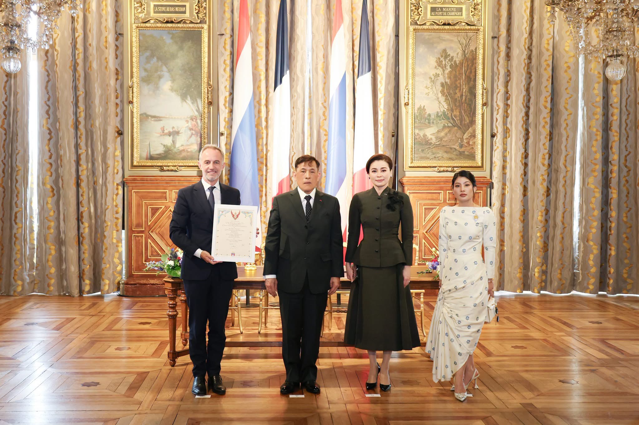 Their Majesties Visit the Arc de Triomphe and Paris City Hall